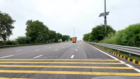 Empty highway road leading towards Taj Mahal in Agra Uttar Pradesh Stock Footage 346676914