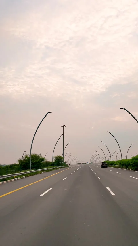 Empty highway road leading towards Taj Mahal in Agra Uttar Pradesh Stock Footage 346692858