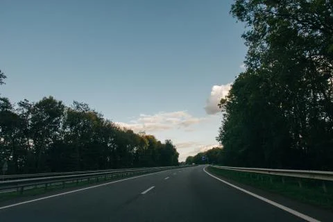 Empty highway. Summer evening highway. Calm road. Stock Photos