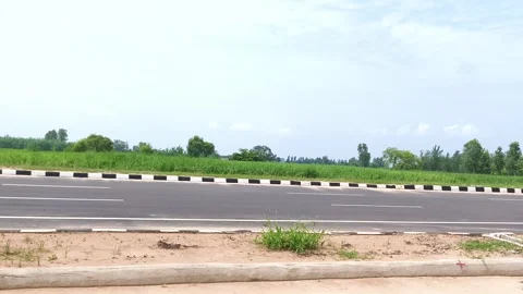Empty Highway Through Green Fields Stock-Footage 343909409
