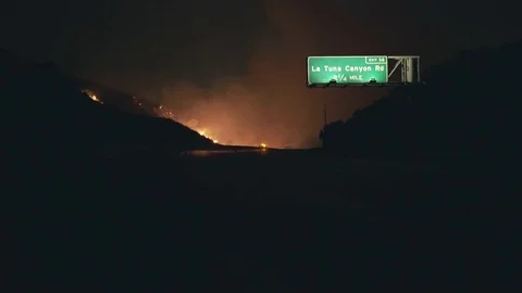 Empty Highway with  Wildfire in Background 動画素材 79938306