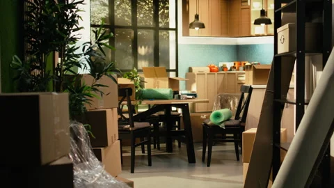 Empty home, stacked boxes, for moving in concept, furniture and belongings Stock Footage 342903619