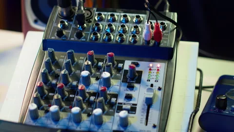 Empty home studio desk with motorized faders and pre amp knobs 스톡 동영상 281375854