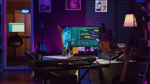 Empty home studio filled with recording and mixing instruments Stock Photos