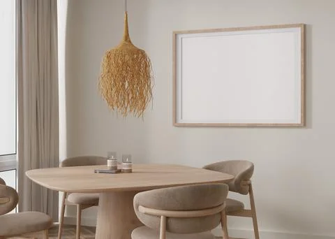 Empty horizontal picture frame on beige wall in modern living room. Mock up i Stock Photos
