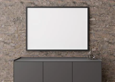 Empty horizontal picture frame on brown stone wall in modern living room. Moc Stock Photos