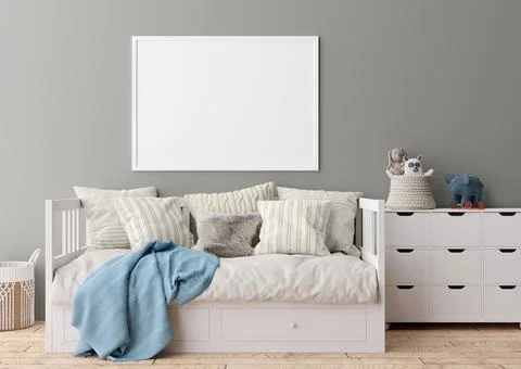 Empty horizontal picture frame on gray wall in modern child room. Mock up int Stock Photos