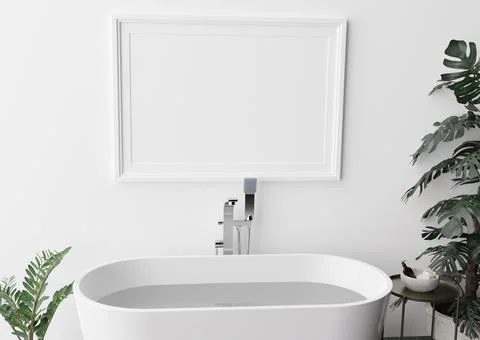 Empty horizontal picture frame on white wall in modern and luxury bathroom. M Stock Photos