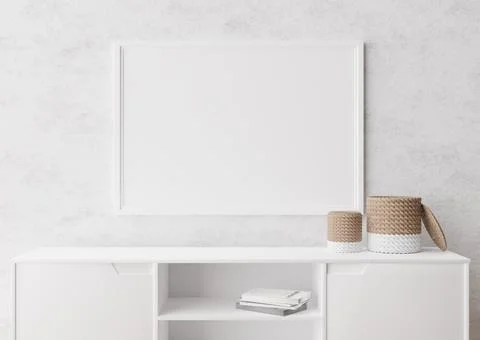 Empty horizontal picture frame on white wall in modern living room. Mock up i Stock Photos