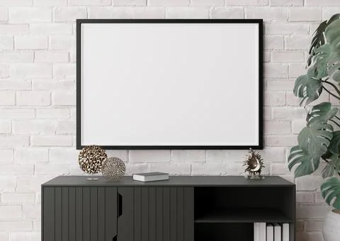 Empty horizontal picture frame on white brick wall in modern living room. Moc Stock Photos