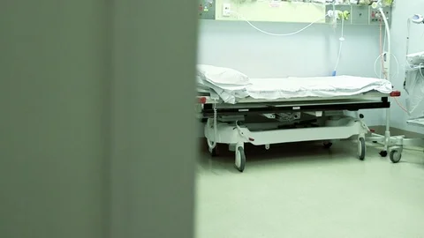 Empty hospital bed in emergency isolation room Stock Footage 127270259