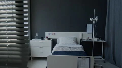 Empty Hospital Bed in Modern Ward Room Waiting for Patient Stock Footage 340626938