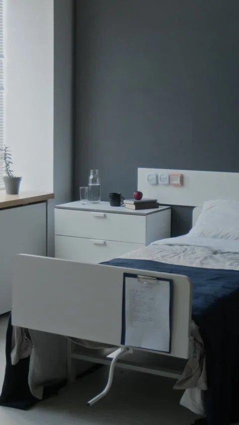 Empty Hospital Bed in Modern Ward Waiting for Patient Admission Stock Footage 340636892
