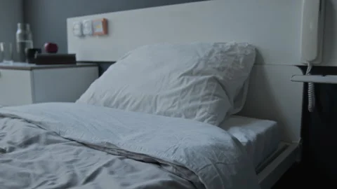 Empty Hospital Bed in Ward Room Showing Patient Discharge Stock Footage 340625189