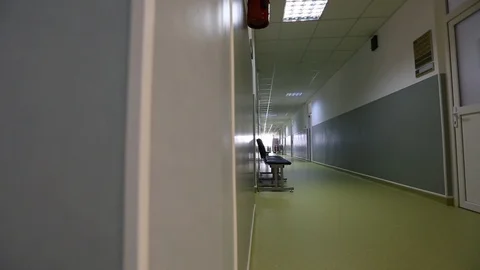Empty Hospital Tracking By Waiting Chairs Wide Shot Stock-Footage 102448145