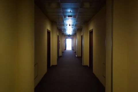 Empty hotel interior, light at the end corridor. The end concept Foto stock