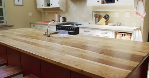 Empty house interior with table and kitchen with cooking equipment Video stock 220584586