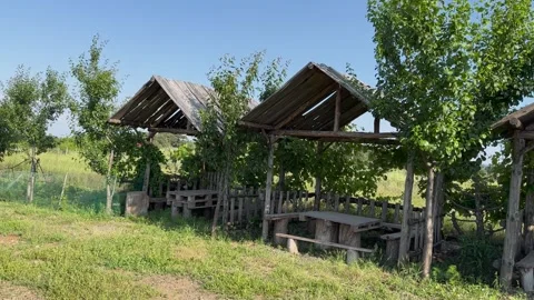 Empty huts on a mountain road Stock Footage 249765062