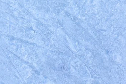 Empty ice rink with skate marks after the session outdoor. Stock Photos