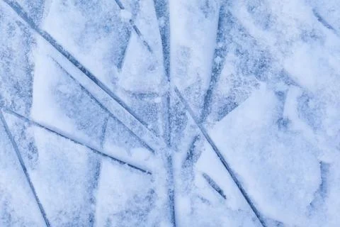 Empty ice rink with skate marks after the session outdoor. Stock Photos