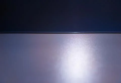 Empty illuminated surface of the purple table background Stock Photos