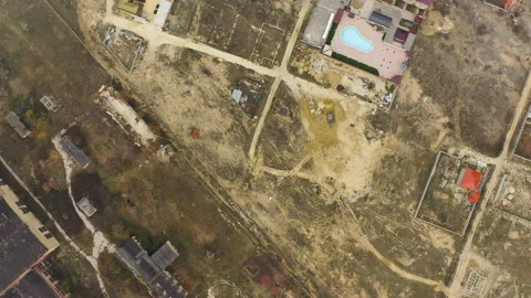 Empty industrial area with small abandoned constructions Stock Footage 143973427