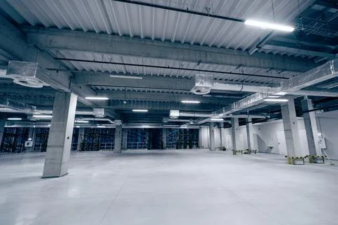 Empty industrial hall with ceiling ventilation system Stock Photos
