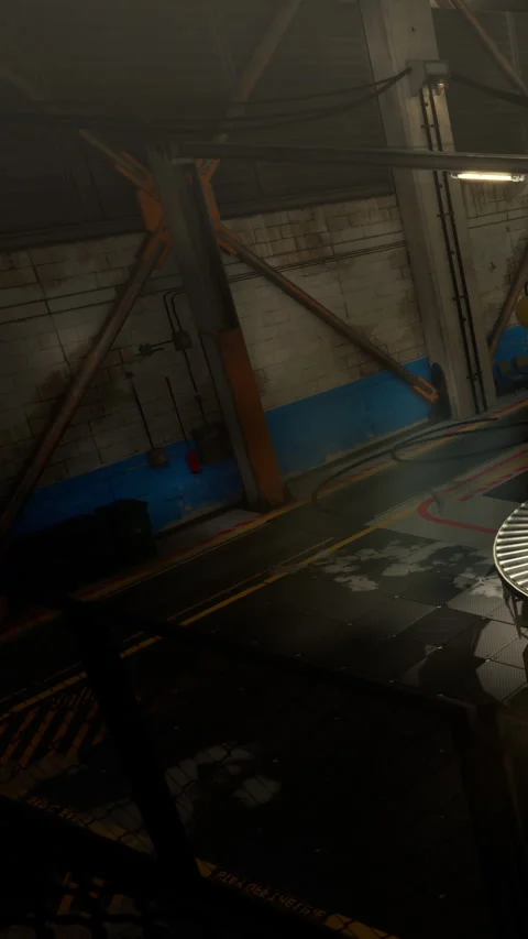 Empty industrial space with blue wall and scattered debris during daytime Stock Footage 342102231