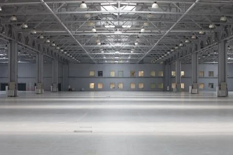 Empty industrial warehouse Stock Photos