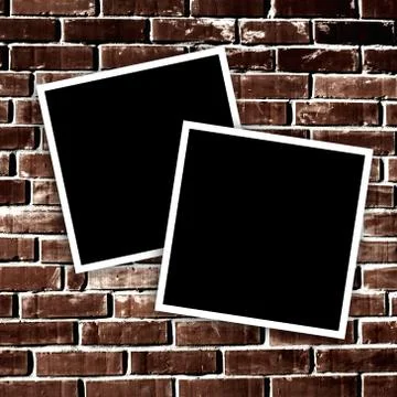 Empty instant photos on grunge brick wall background Stock-Fotos