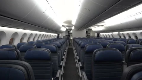 Empty interior of a 787 commercial airplane economy class. Stock Footage 169811788