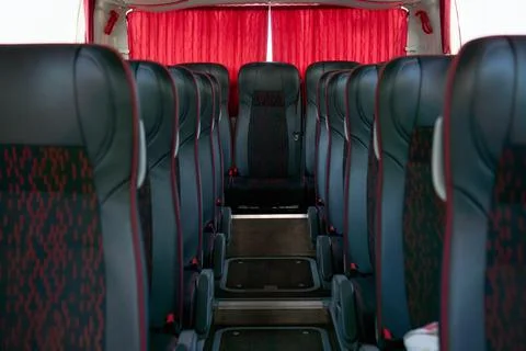 Empty interior of coach seating for tourism and travel Stock Photos