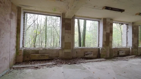 Empty interior inside a destroyed building in  ghost city Pripyat Ukraine Video stock 83232128