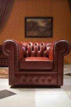 Empty interior living room background in warm colors decorated with classic l Stock Photos
