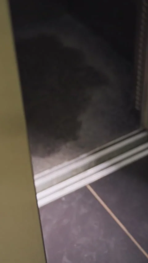 Empty Interior of Modern Elevator with Shiny Metal Walls and Floor Tiles Stock Footage 318805555