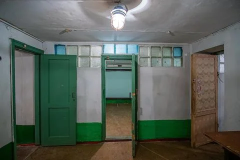 Empty interior of an old underground bomb shelter of the 1980s or basement Stock Photos