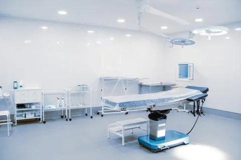 Empty interior operating room and modern equipment in hospital. Medical device Stock Photos