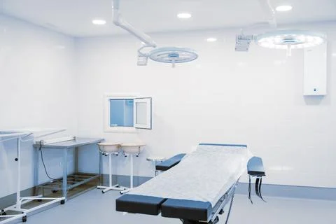 Empty interior operating room and modern equipment in hospital. Medical device Stock Photos
