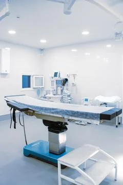Empty interior operating room and modern equipment in hospital. Medical device Stock Photos