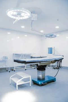 Empty interior operating room and modern equipment in hospital. Medical device Stock Photos