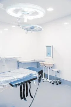 Empty interior operating room and modern equipment in hospital. Medical device Stock Photos