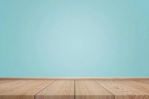 Empty interior room with light blue cement wall texture and brown wooden floo Stock Photos