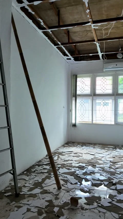 Empty Interior Room Under Renovation with Broken Tiles and Ladder Stock Footage 342091458