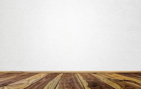 Empty interior room with white cement wall texture and brown wooden floor pat Stock Photos