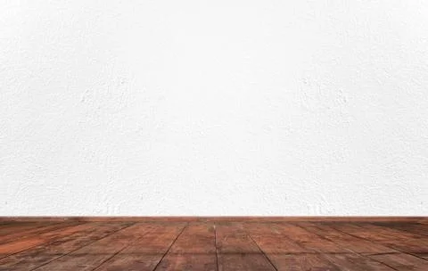 Empty interior room with white cement wall texture and brown wooden floor pat Stock Photos