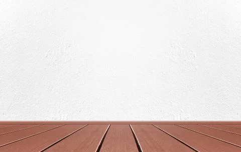 Empty interior room with white cement wall texture and brown wooden floor pat Stock Photos