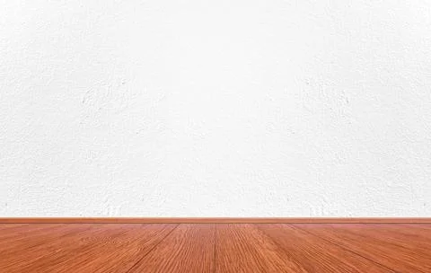 Empty interior room with white cement wall texture and brown wooden floor pat Stock Photos