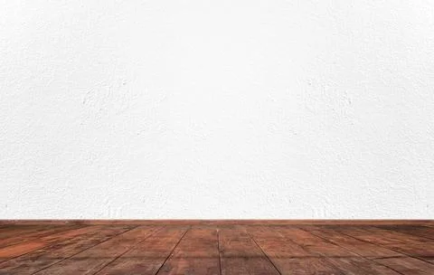 Empty interior room with white cement wall texture and brown wooden floor pat Stock Photos