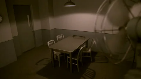 EMPTY INTERROGATION ROOM.  HIGH ANGLE SLIDER SHOT IN 4K.  No people. Vídeos de archivo 132986774