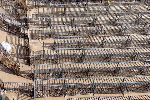 Empty iron barricade for temple queue management during daytime Stock Photos